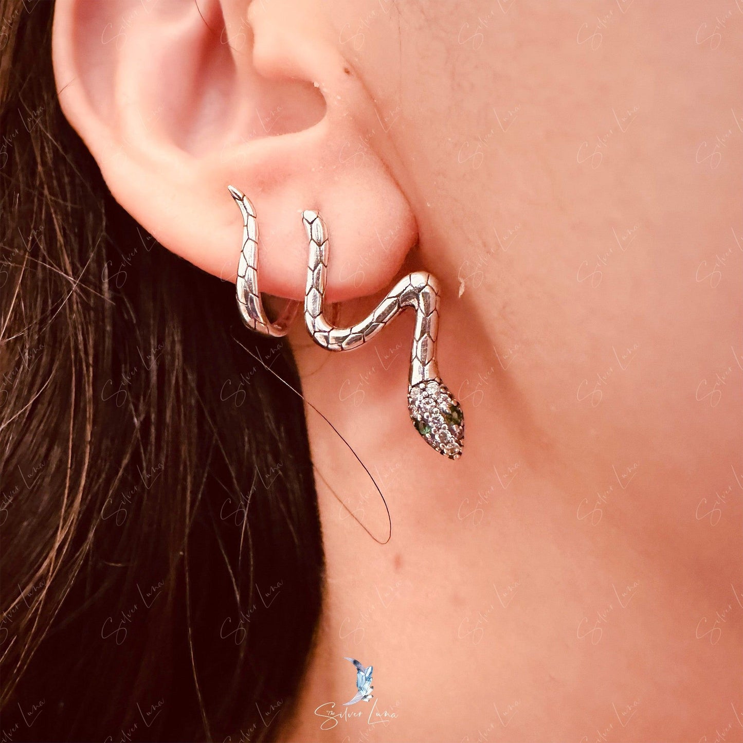 Snake wrap with green eyes stud earrings