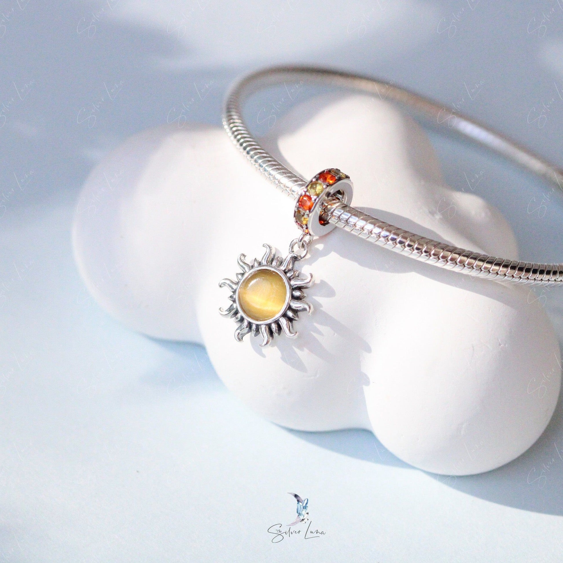 sun dangle charm