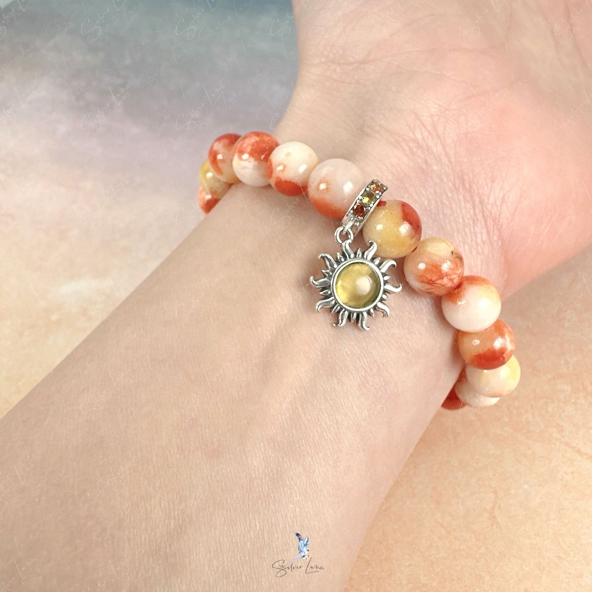 sun charm orange beaded bracelet