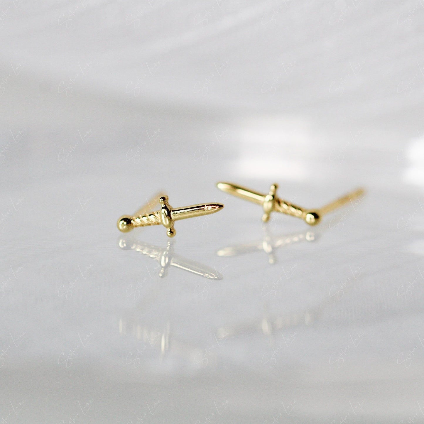Tiny sword dagger sterling silver stud earrings