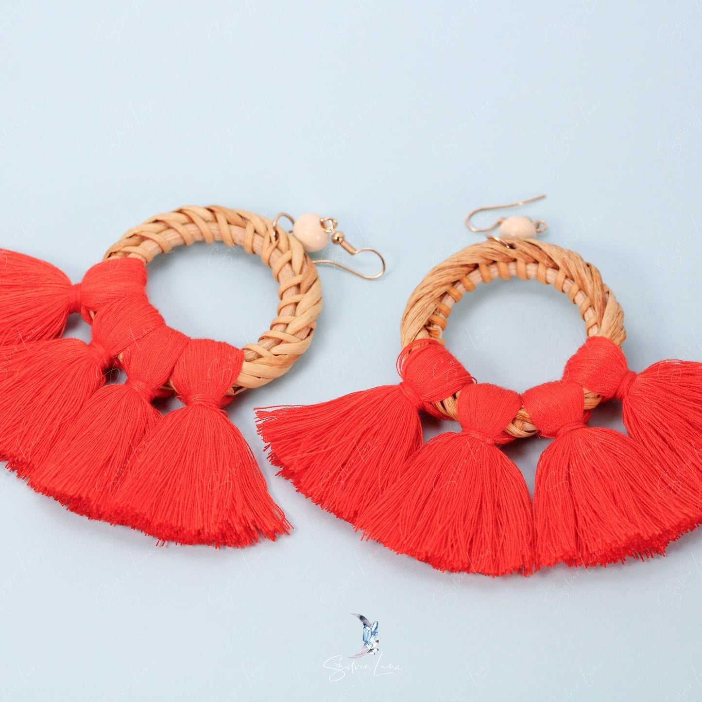 Red fan cotton tassel statement earrings