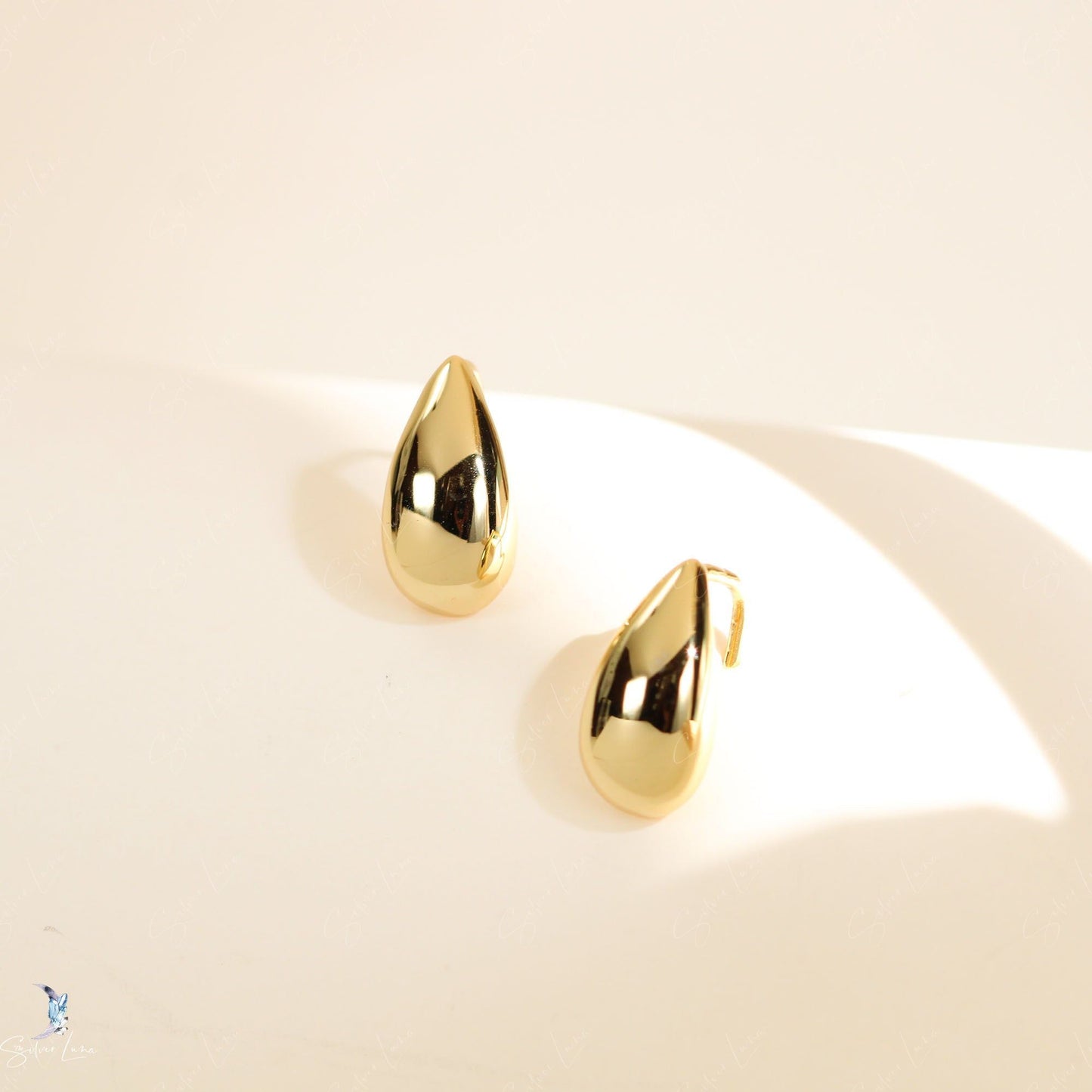 Golden teardrop silver sterling silver earrings