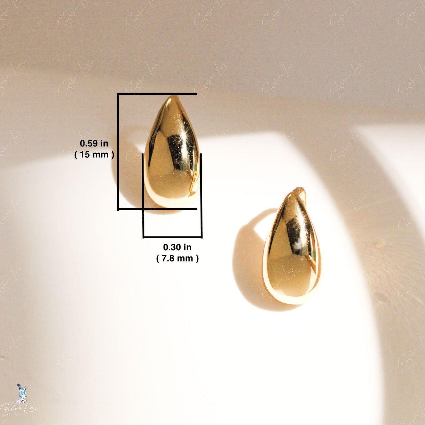 Golden teardrop silver sterling silver earrings