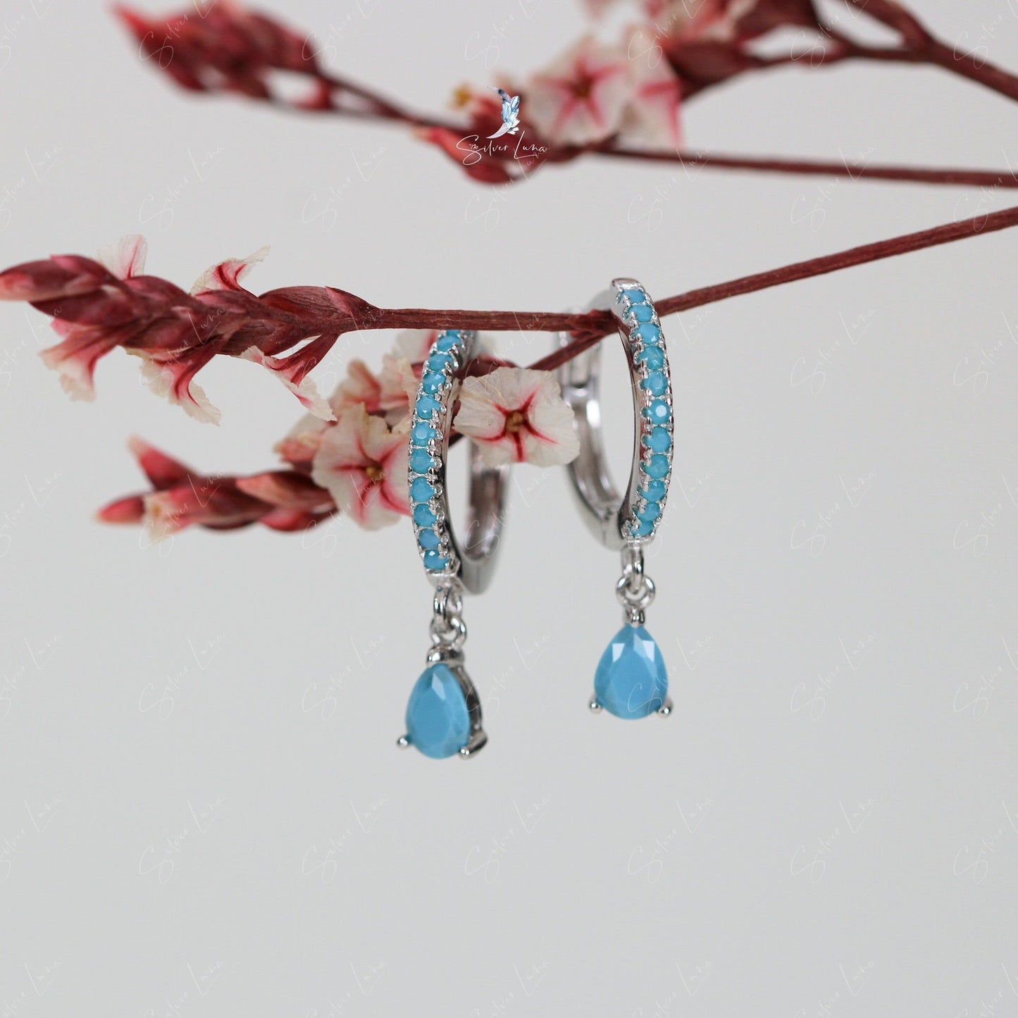Blue teardrop hoop earrings