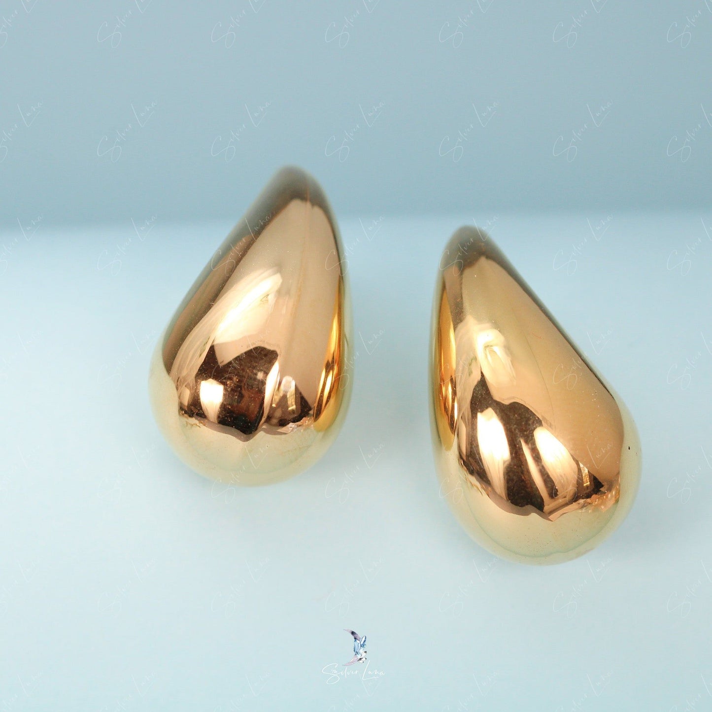 Golden water drop stud earrings