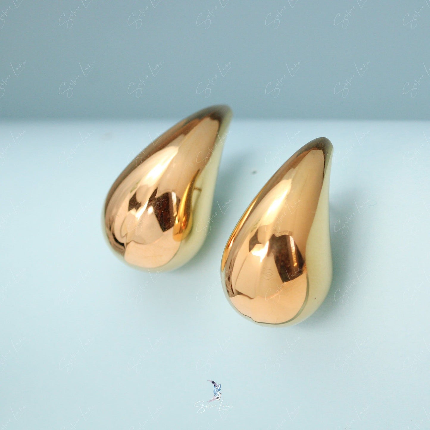 Golden water drop stud earrings