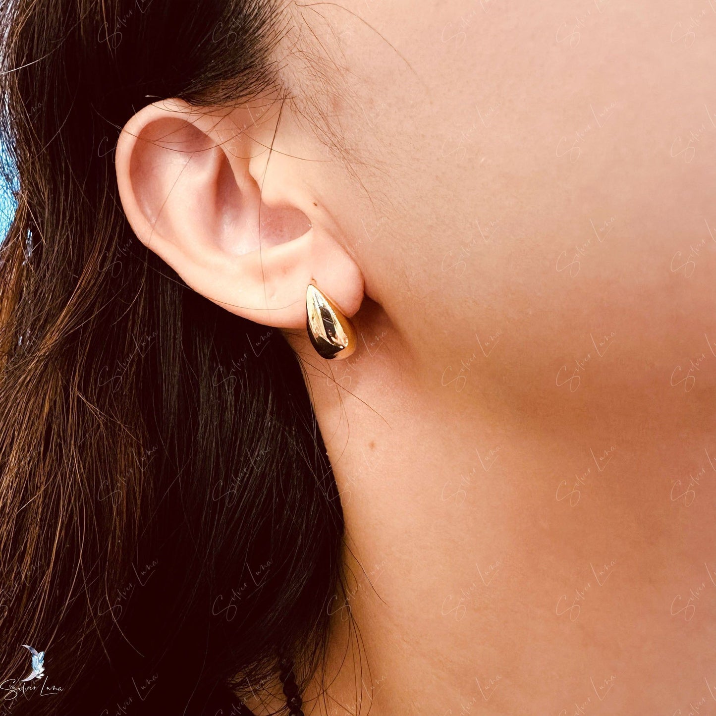 Golden teardrop silver sterling silver earrings