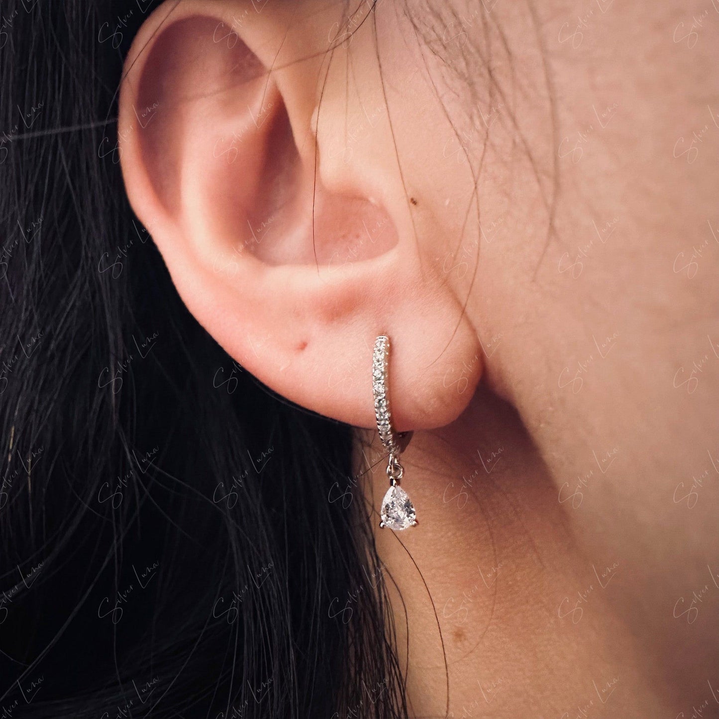 Cubic zirconia teardrop hoop earrings in sterling silver