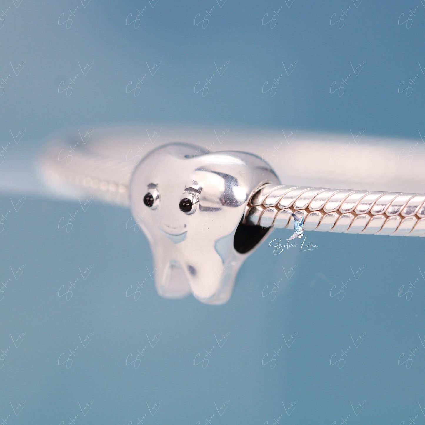 silver tooth charm