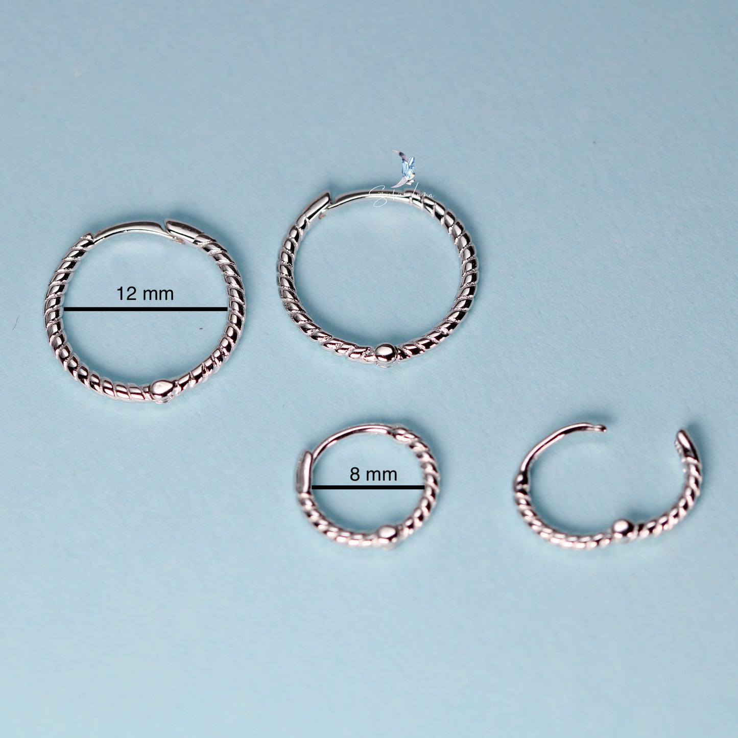 Minimalist twist hoop earrings in sterling silver