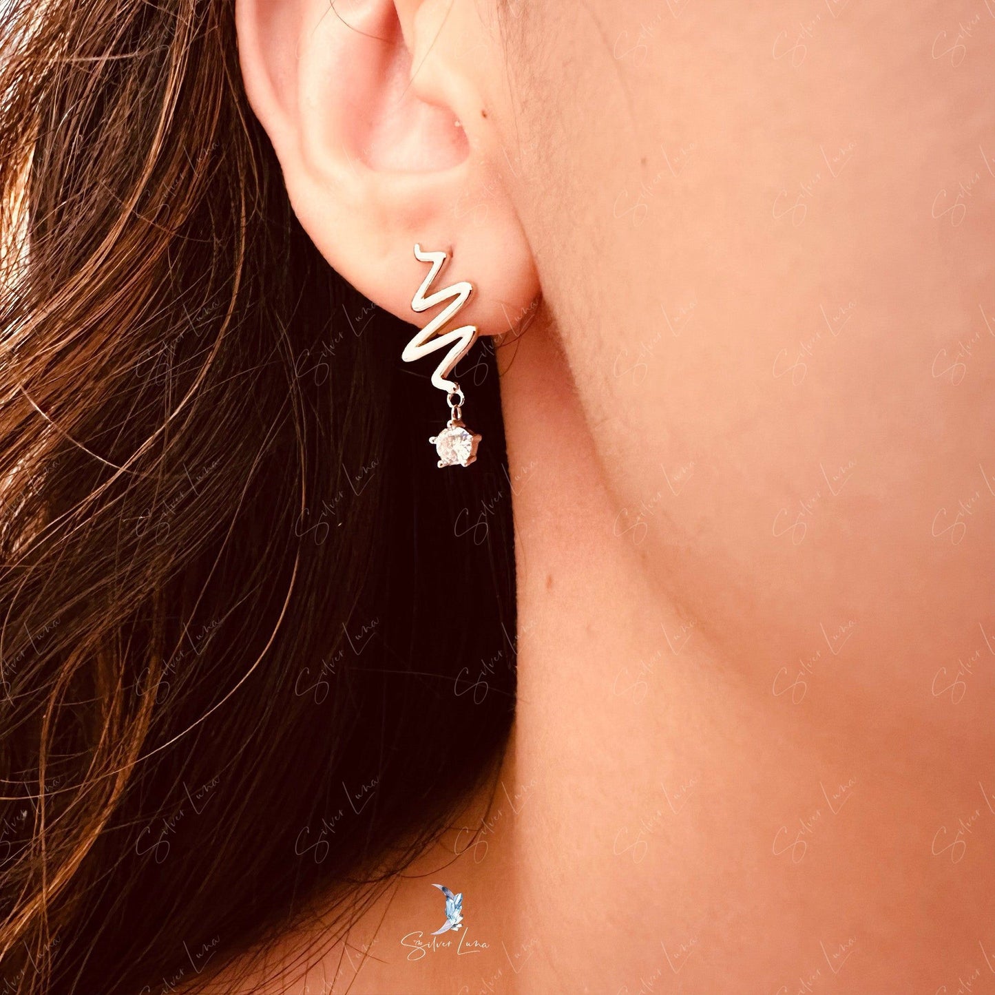 Wavy star drop sterling silver stud earrings
