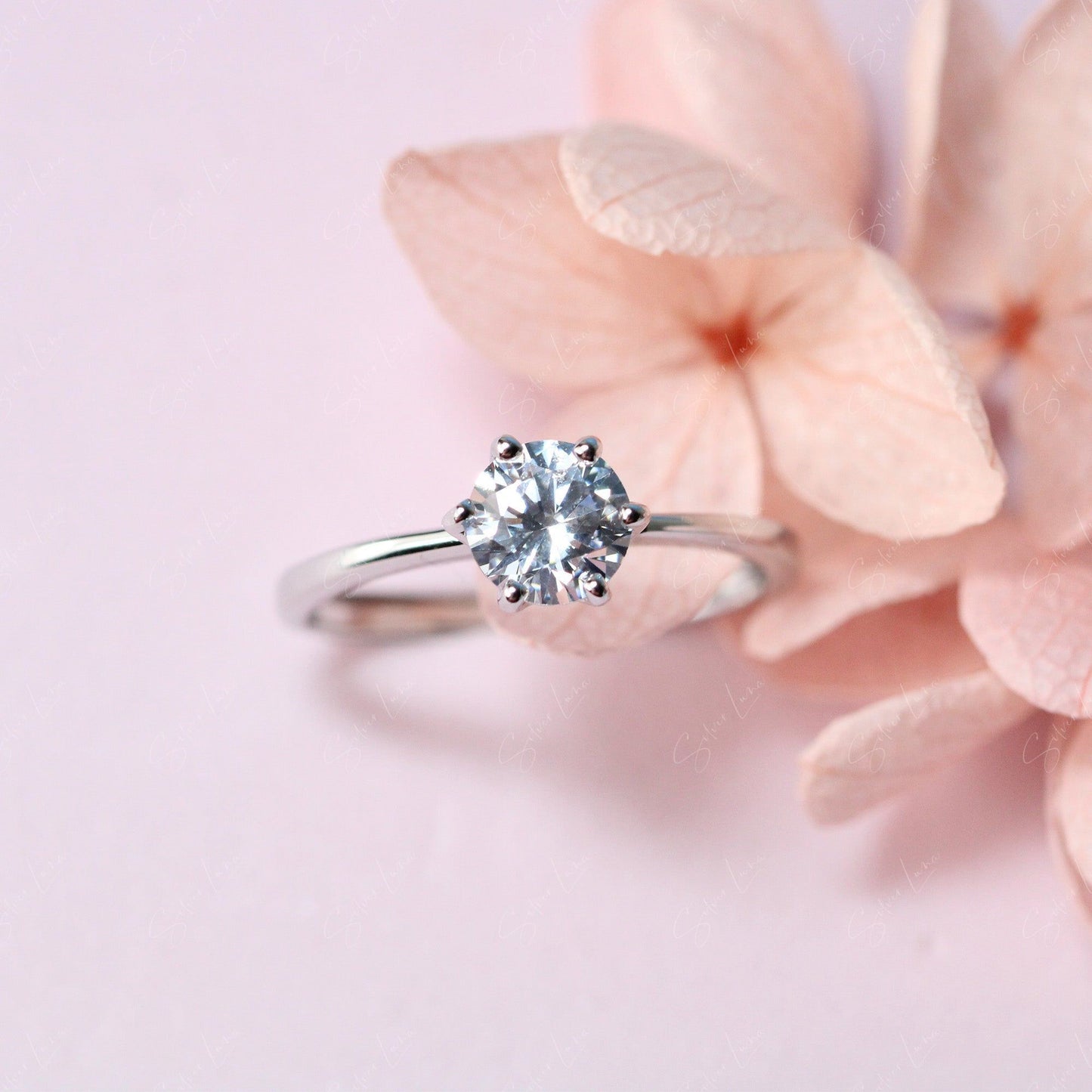 Solitaire cubic zirconia adjustable sterling silver ring