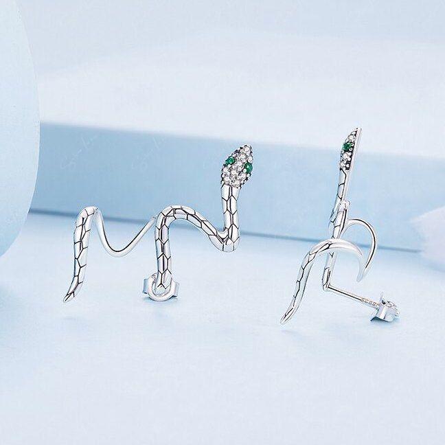 Snake wrap with green eyes stud earrings