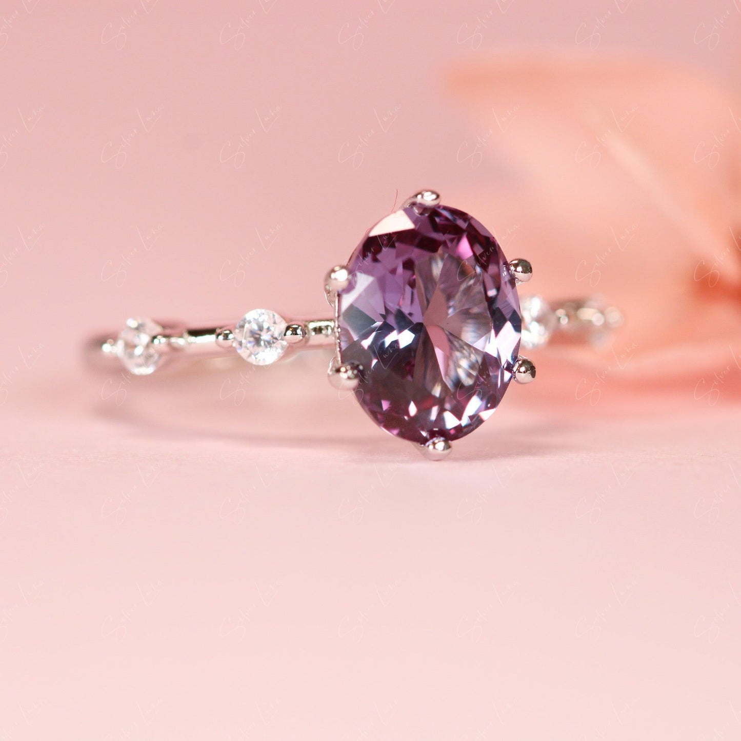 Oval Alexandrite engagement ring in sterling silver