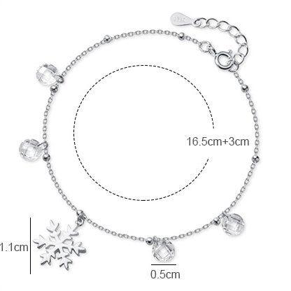 Dainty snowflake and crystal charm bracelet