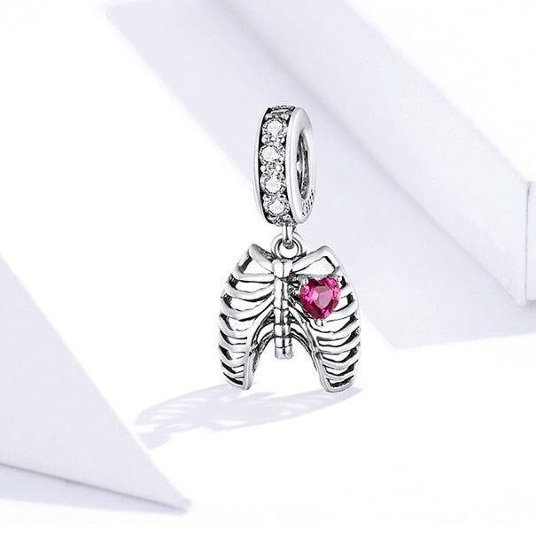 skeleton silver charm