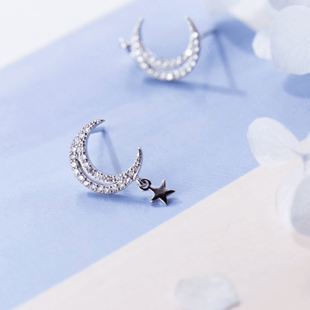 Crescent moon stud earrings with tiny star dangle drop