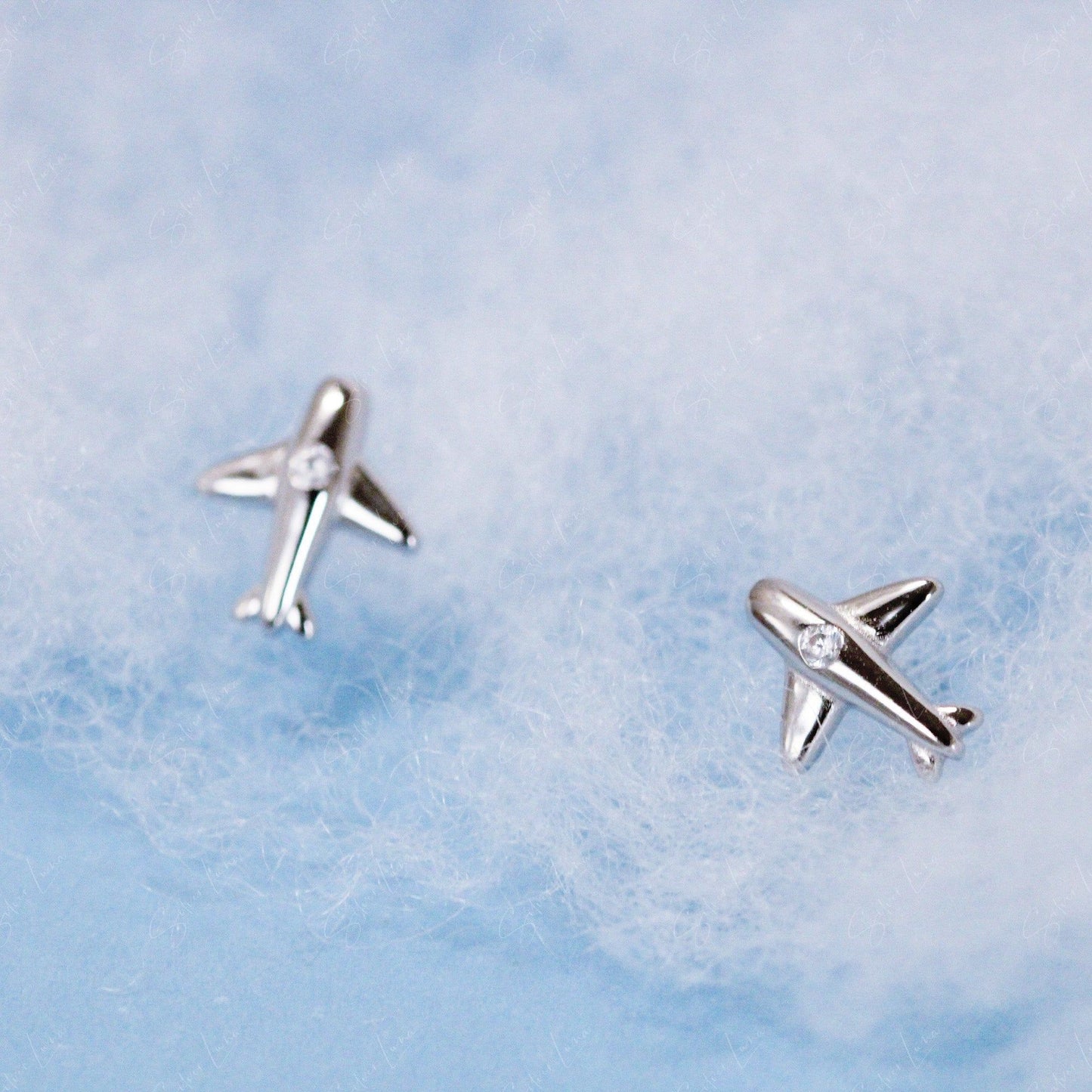 airplane stud earrings