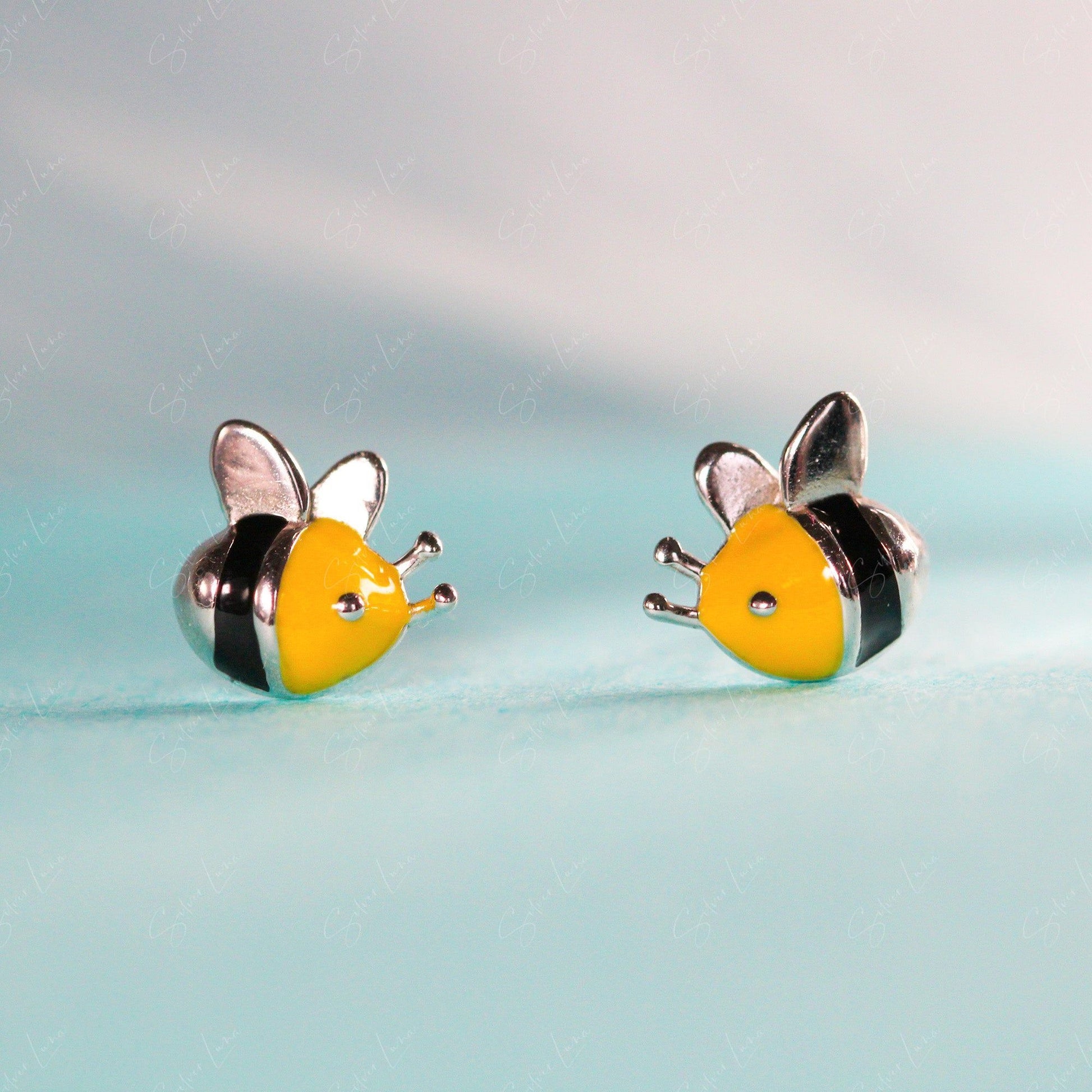 silver bee stud earrings