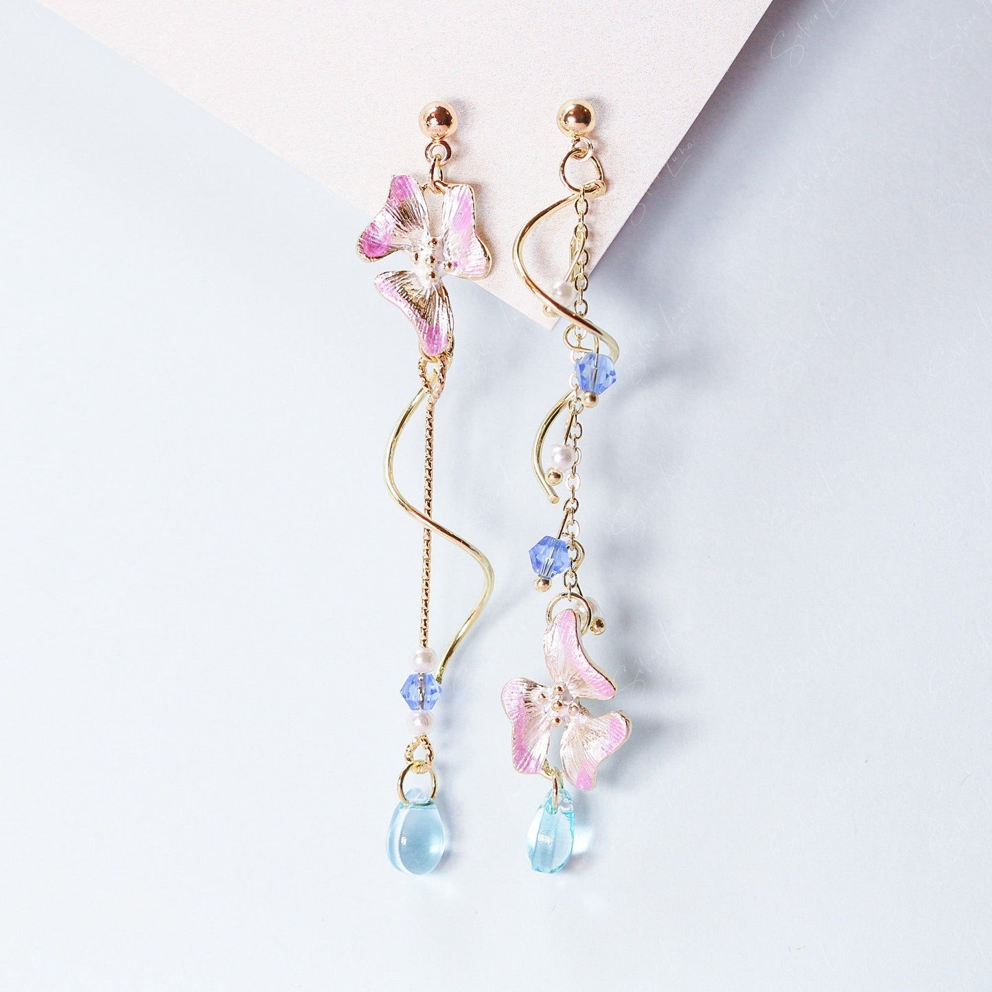 Enamel flower teardrop asymmetric dangle earrings