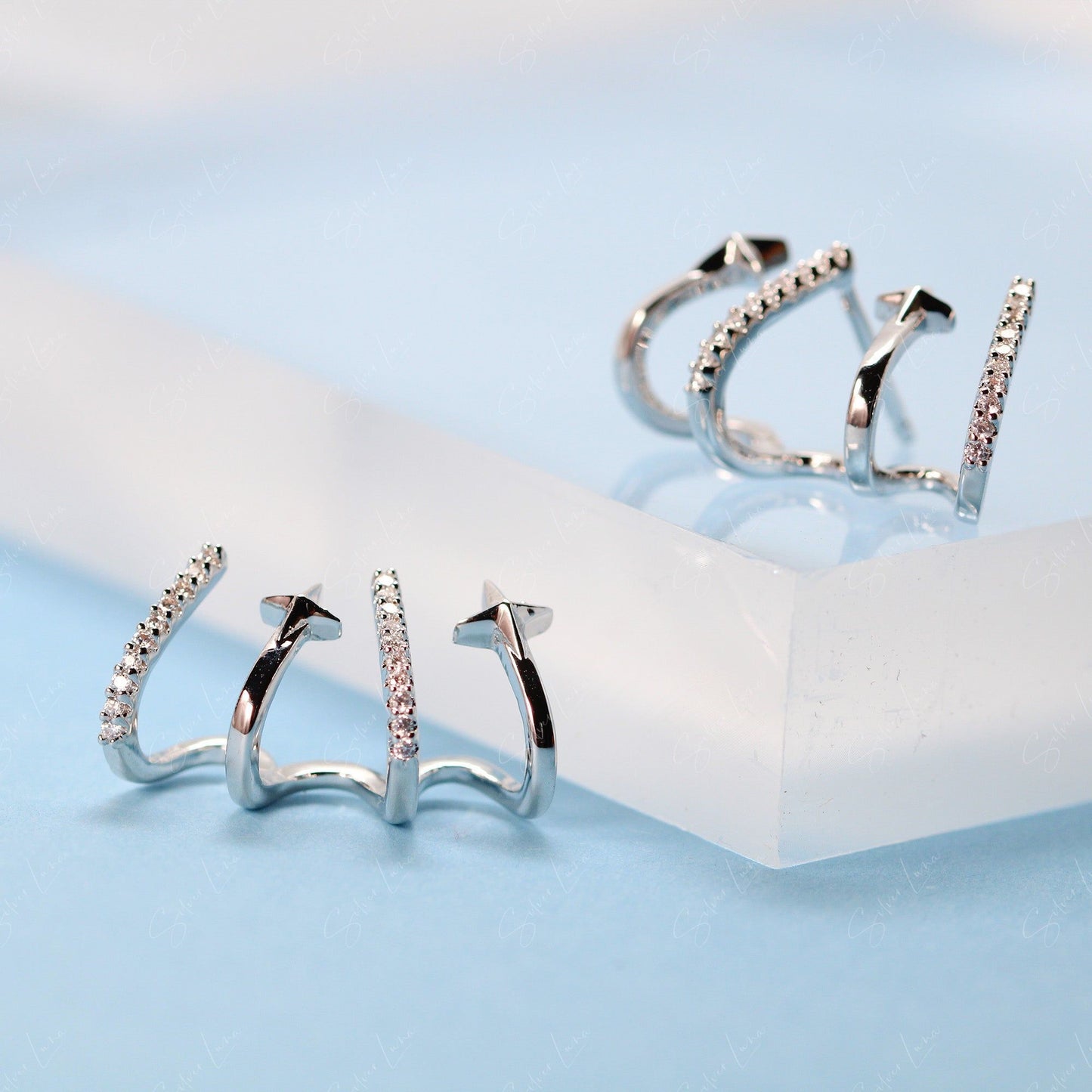 star claw stud earrings