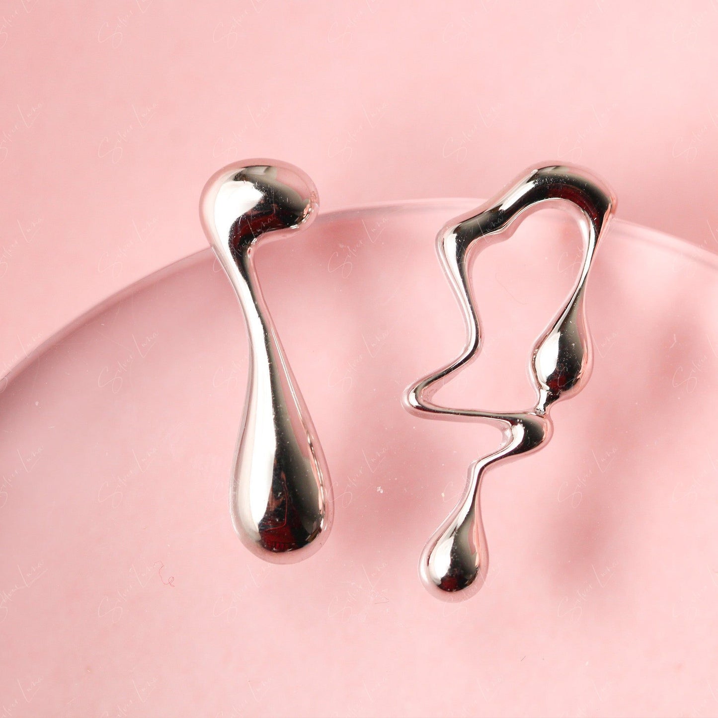 asymmetric drop stud earrings