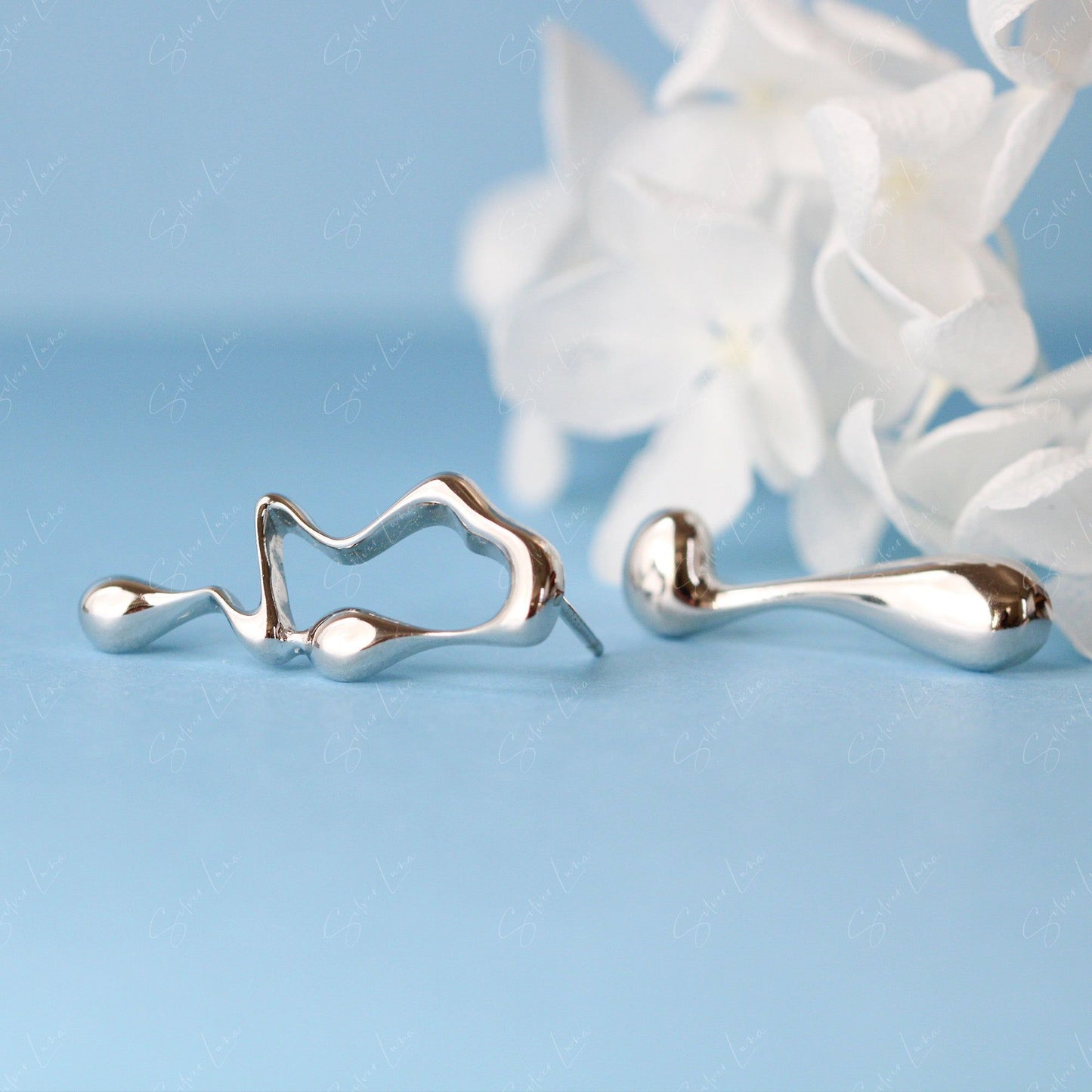 Droplet asymmetric sterling silver stud earrings