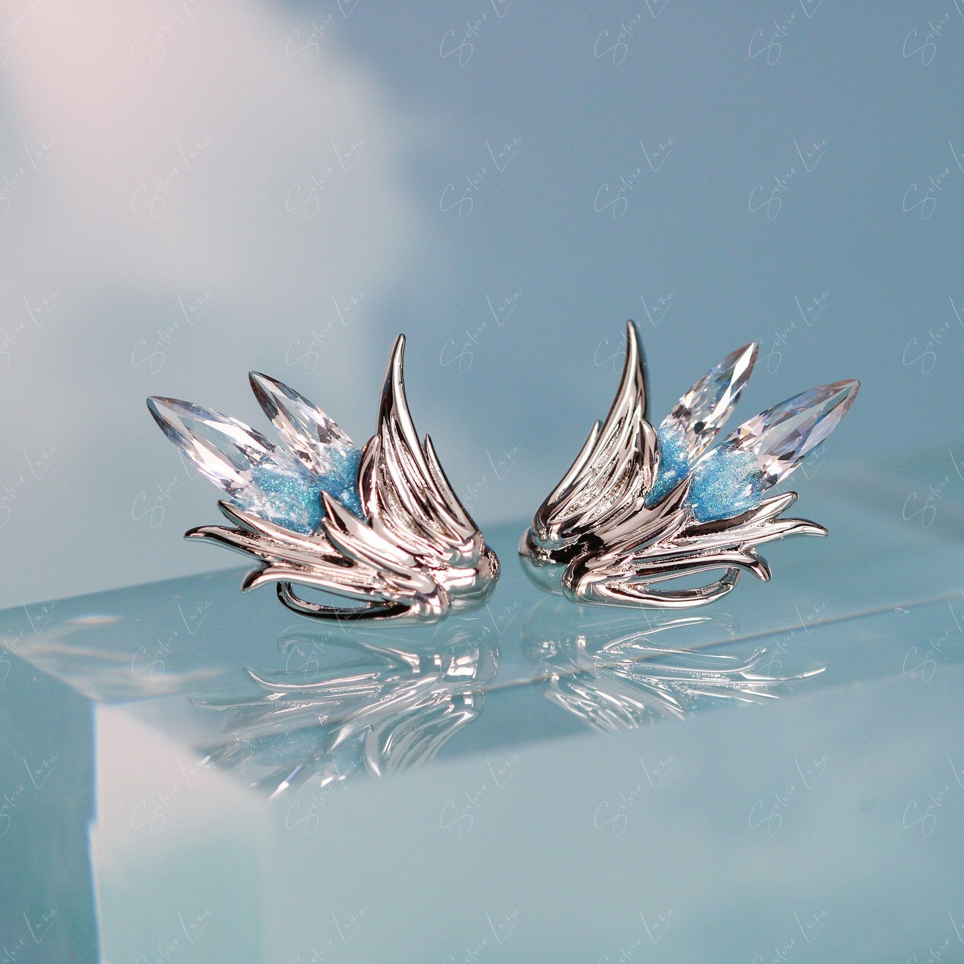 robin wing stud earrings
