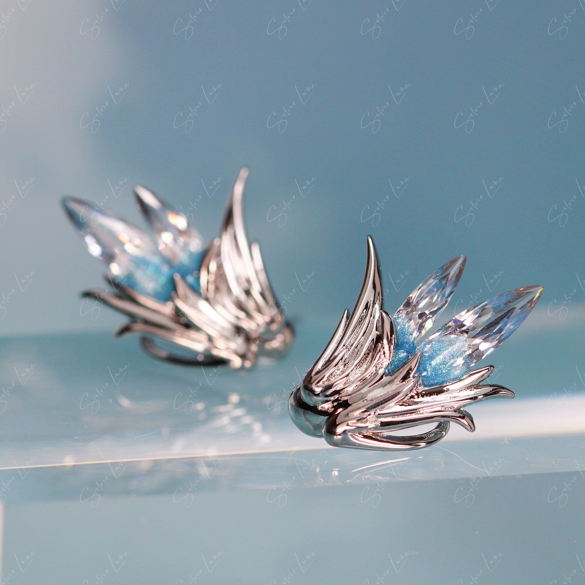 angel wing stud earrings