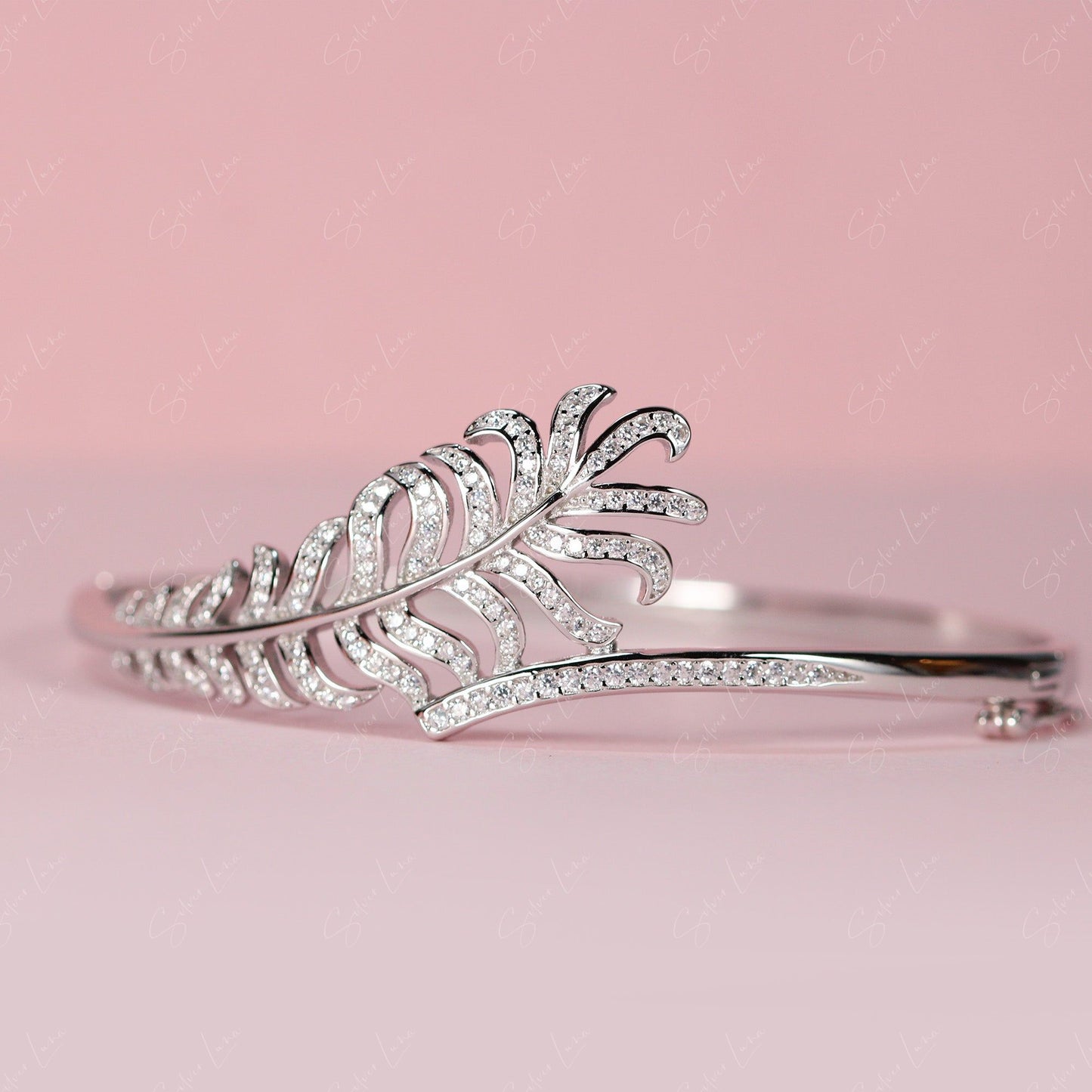 feature wrap silver bangle bracelet