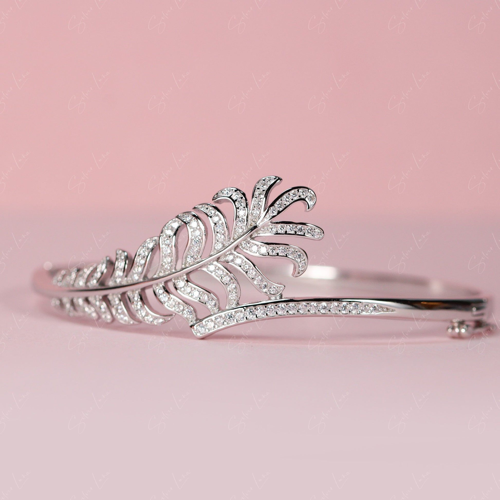 feature wrap silver bangle bracelet