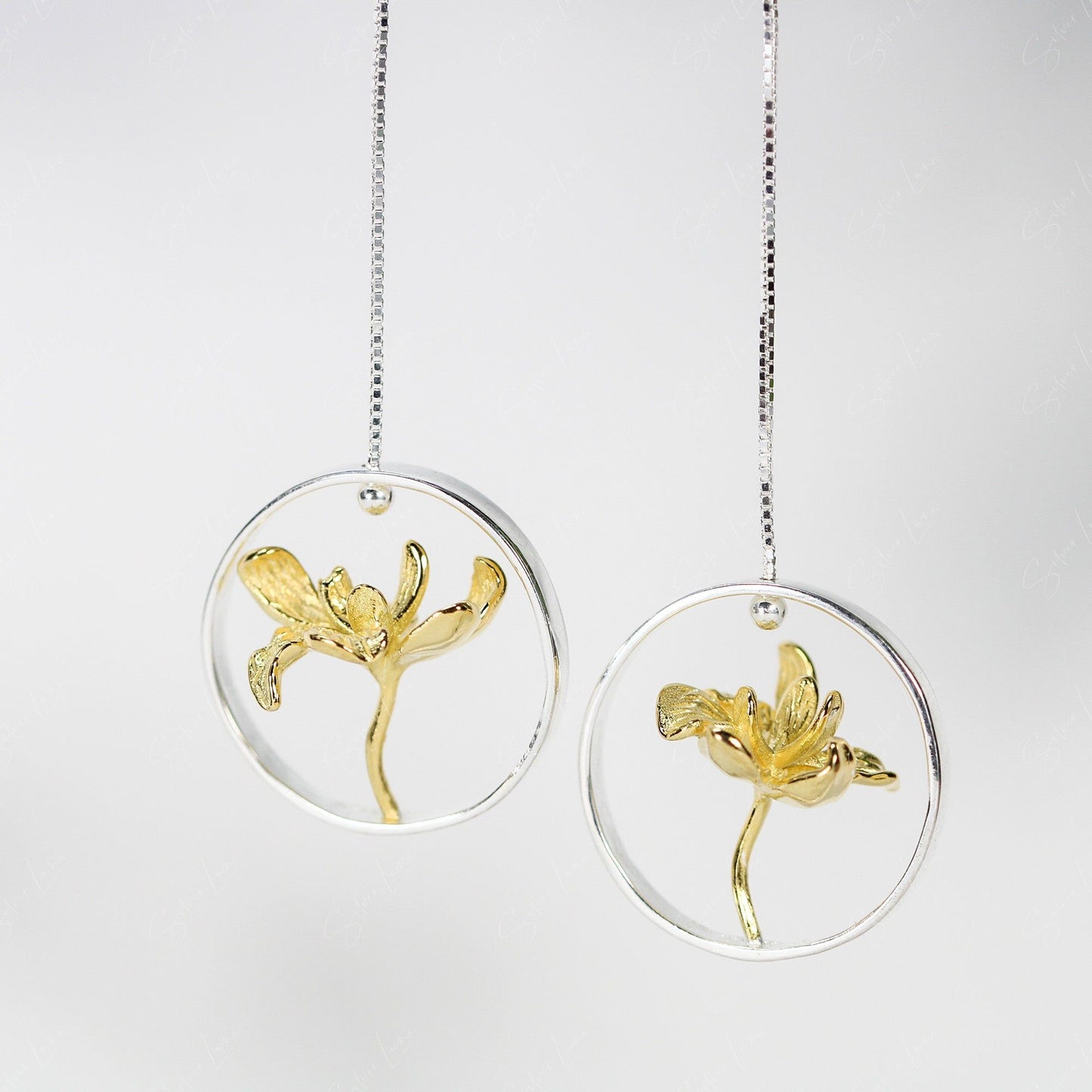 Floating lotus flower dangle drop earrings in sterling silver