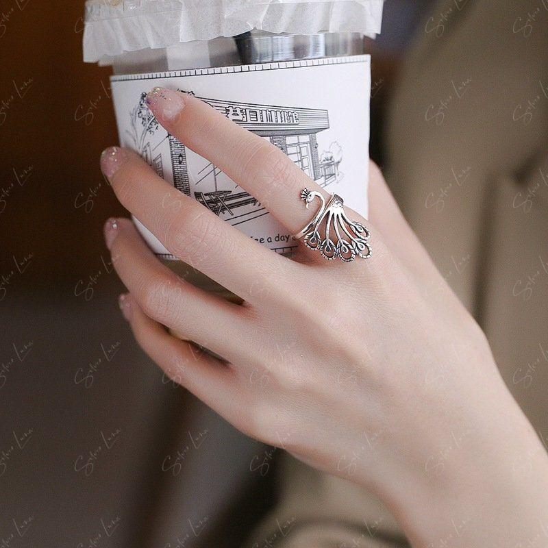 Phoenix Peacock sterling silver adjustable ring
