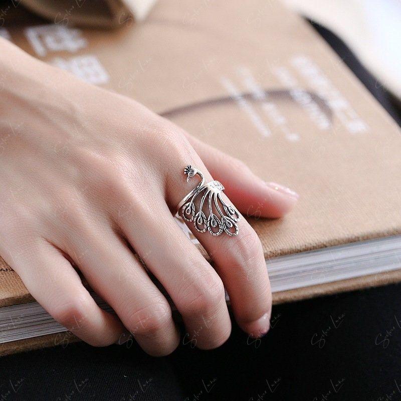 Phoenix Peacock sterling silver adjustable ring