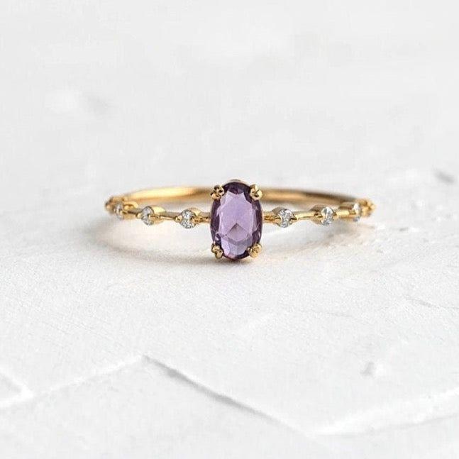 Purple oval cubic zirconia sterling silver ring