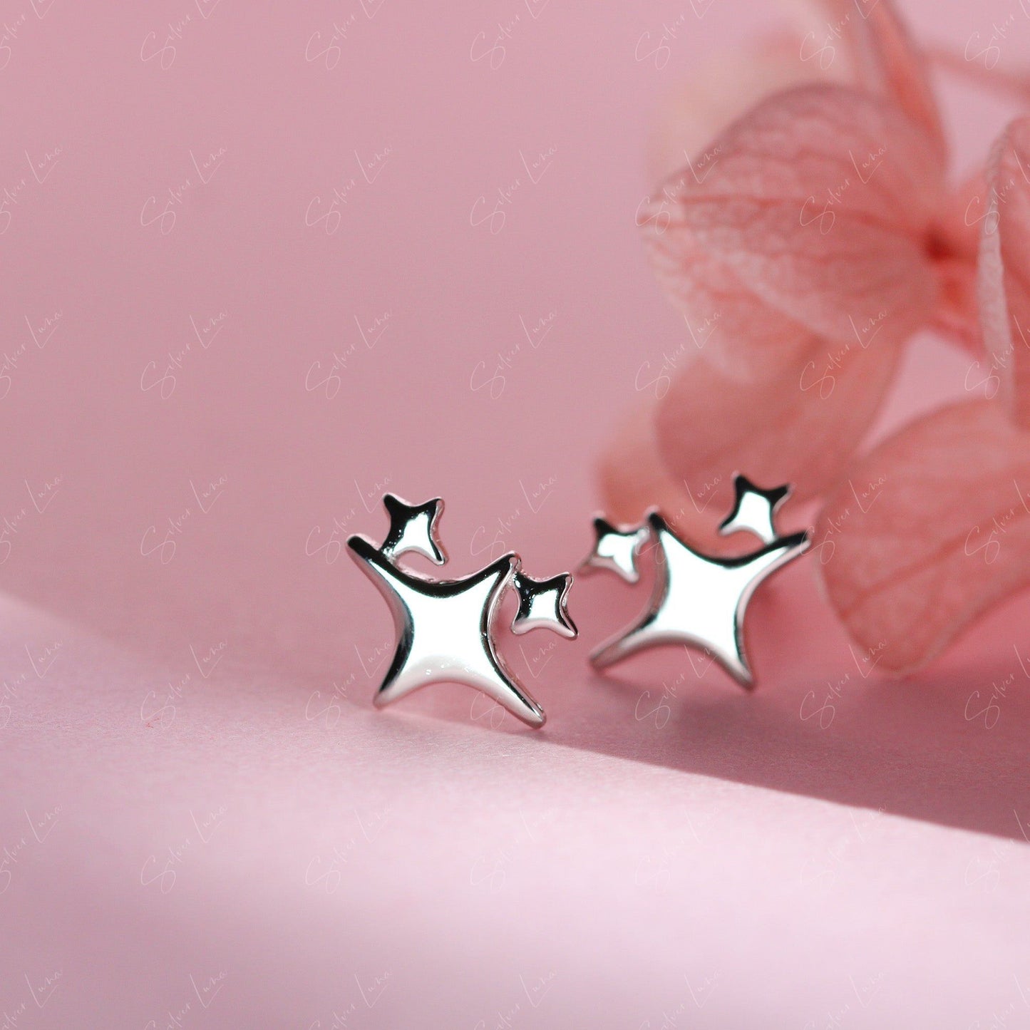 Sparkling star sterling silver stud earrings