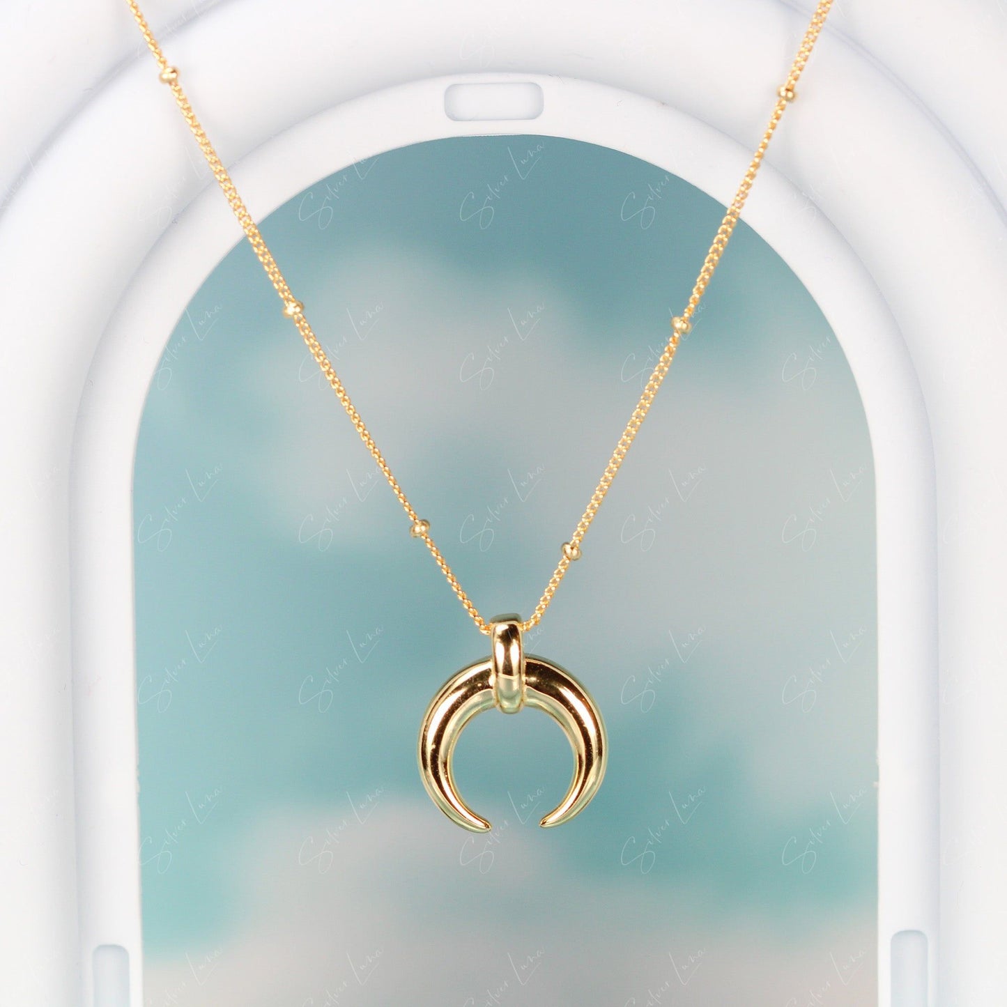 Golden crescent moon pendant necklace