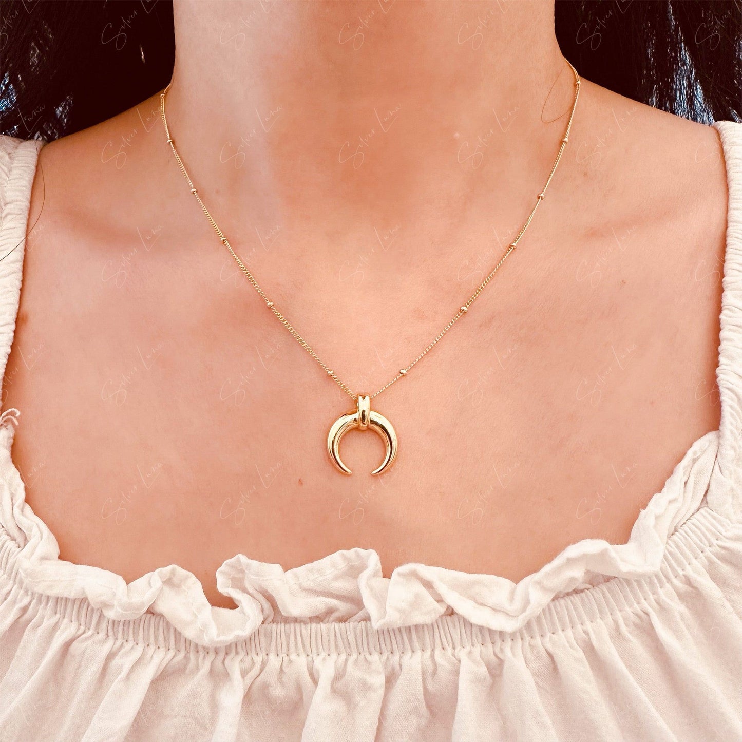 Golden crescent moon pendant necklace
