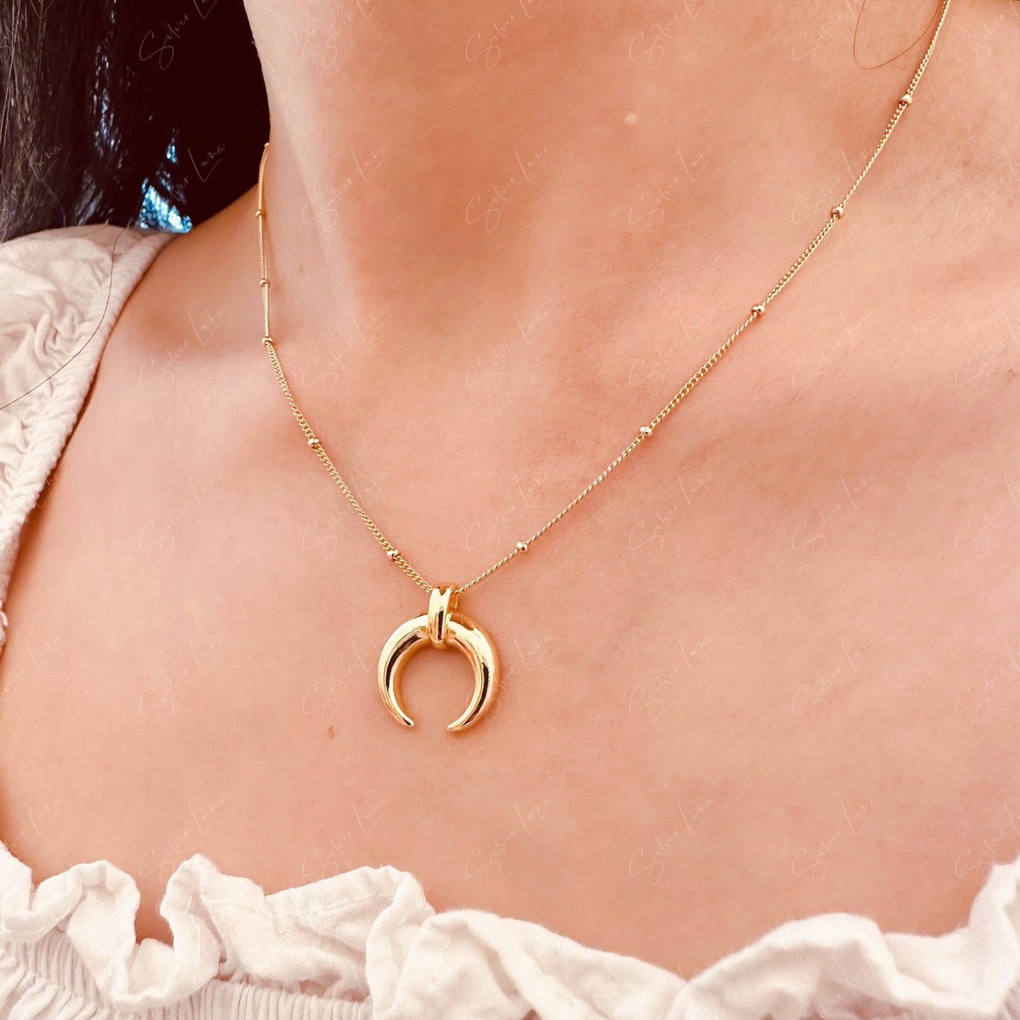 Golden crescent moon pendant necklace