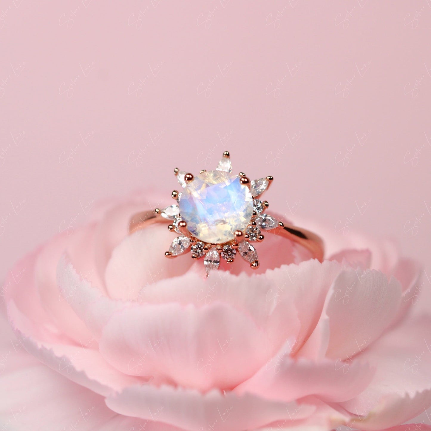 Moonstone halo engagement ring