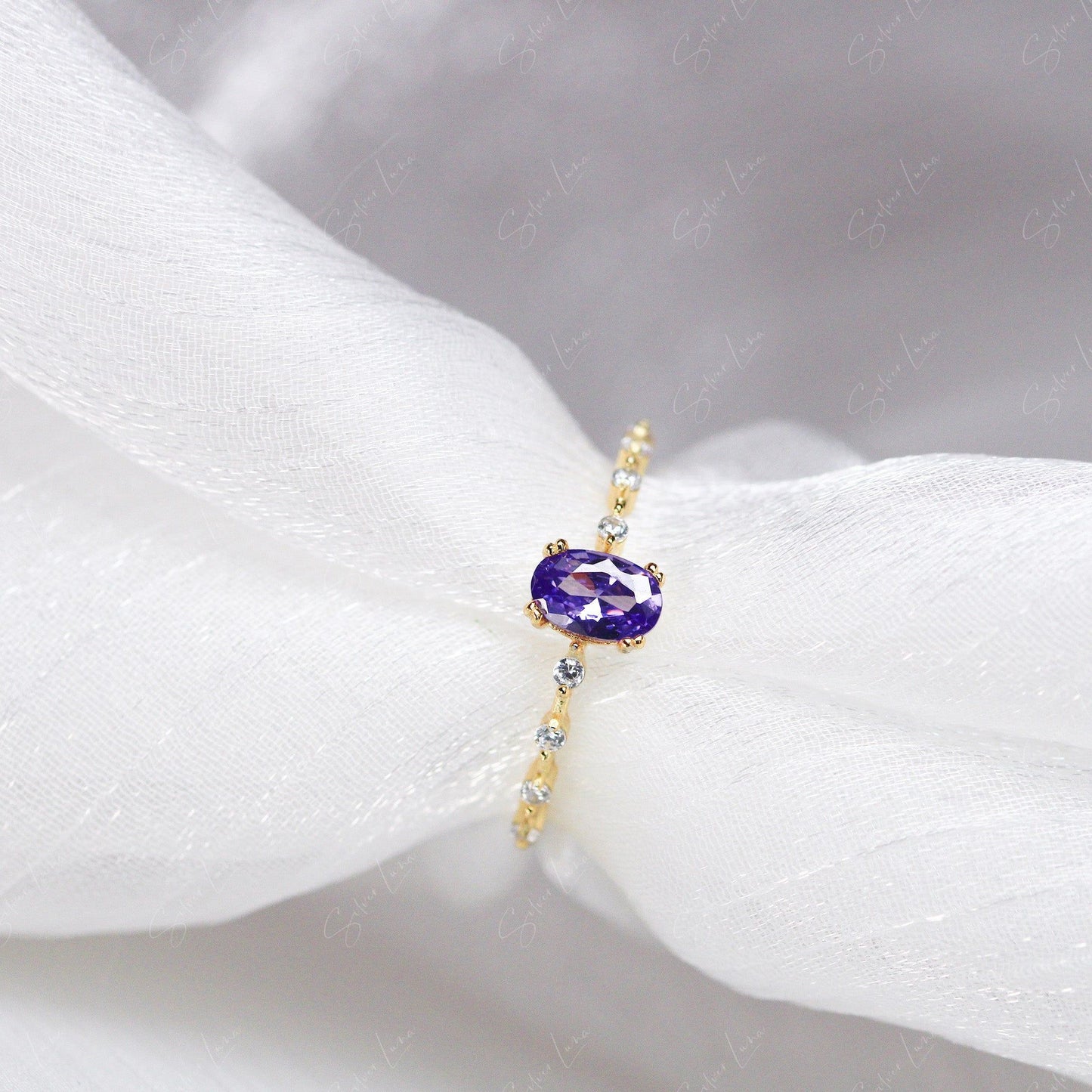 Purple oval cubic zirconia sterling silver ring