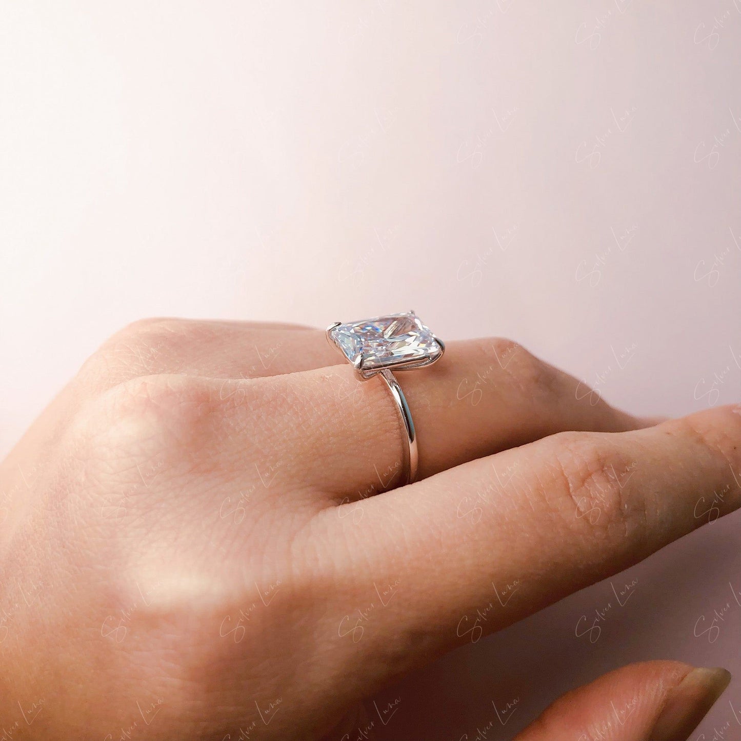 Radiant rectangle cubic zirconia engagement ring