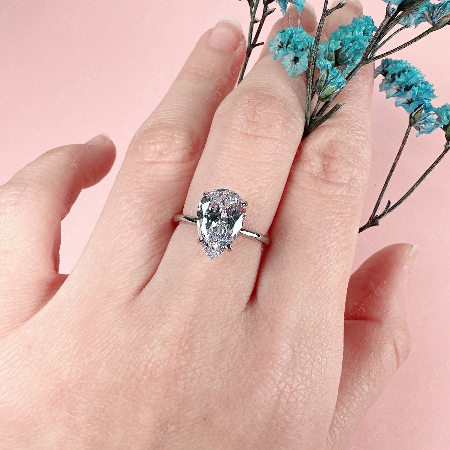 radiant teardrop silver ring