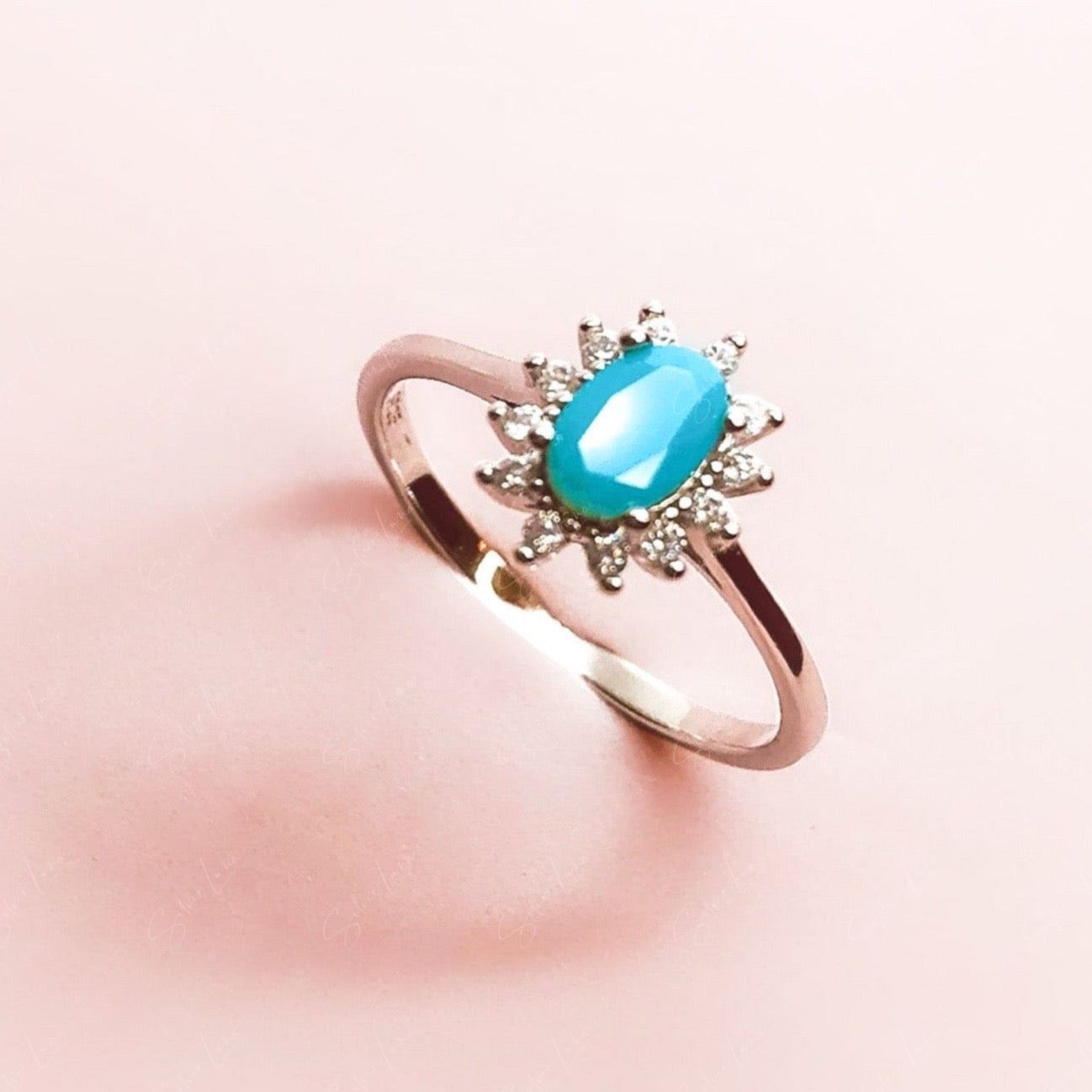 Halo cubic zirconia turquoise sterling silver ring