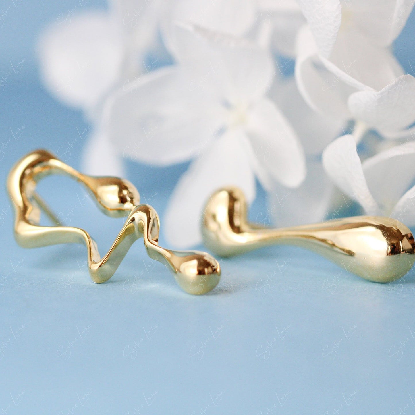 Droplet asymmetric sterling silver stud earrings