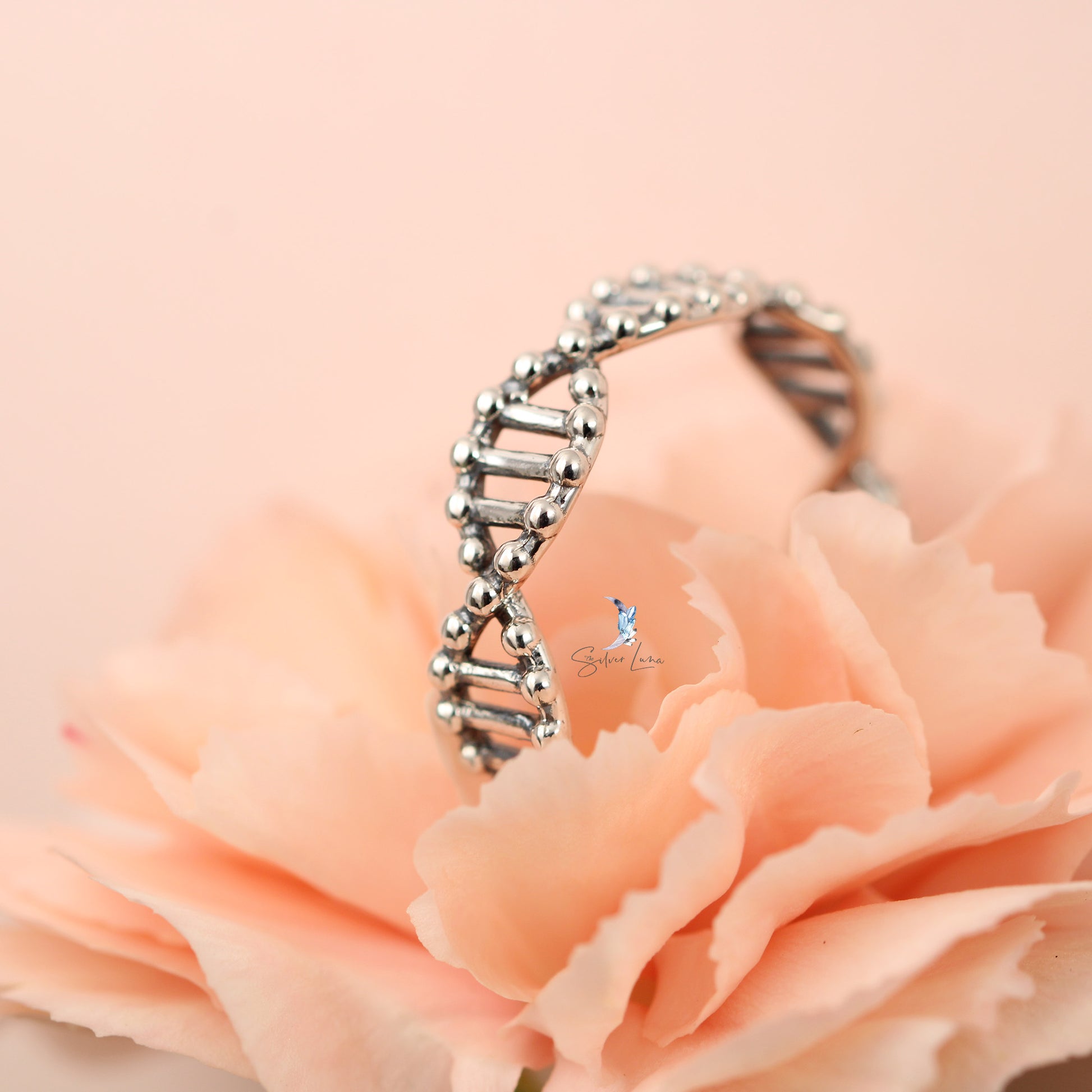 DNA strain sterling silver ring