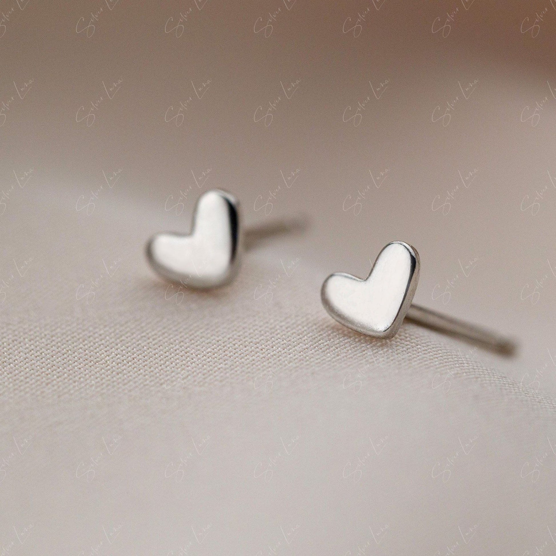minimalist heart stud earrings