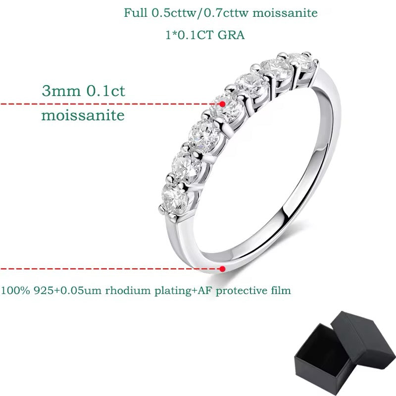 0.7 CT Moissanite wedding band in sterling silver