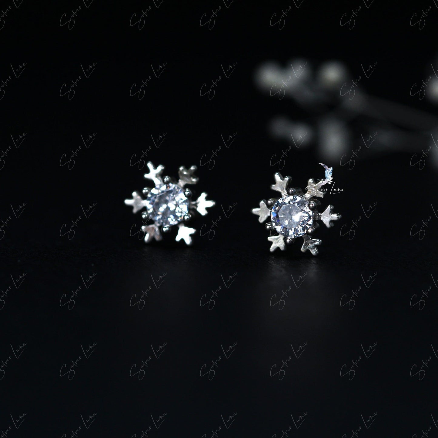 snowflake stud earrings