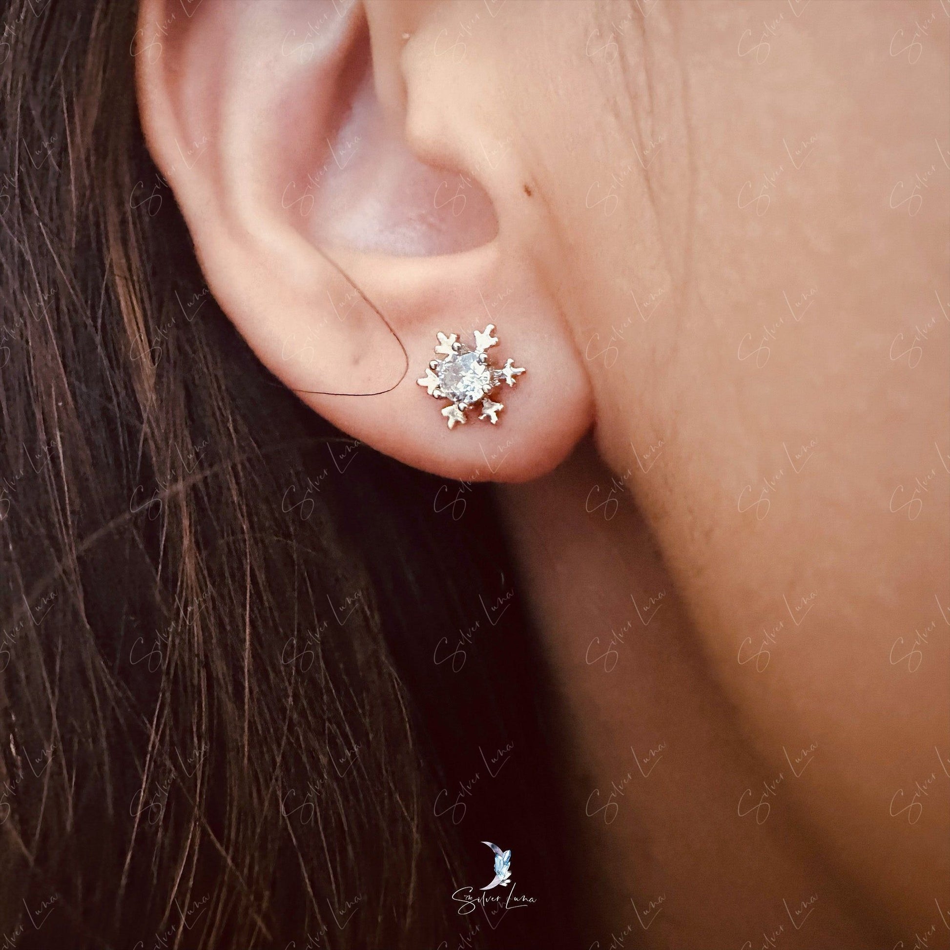 snowflake silver stud earrings
